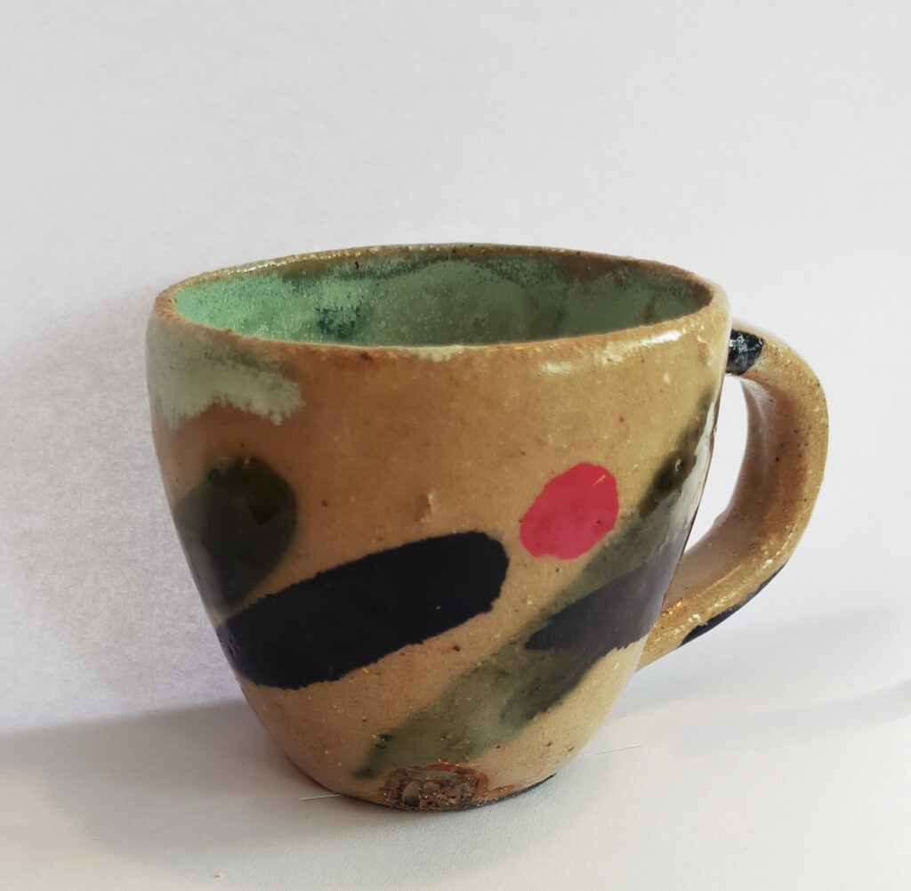 Painted clay mug